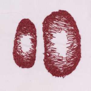 Embroidery patch repair blobs in red